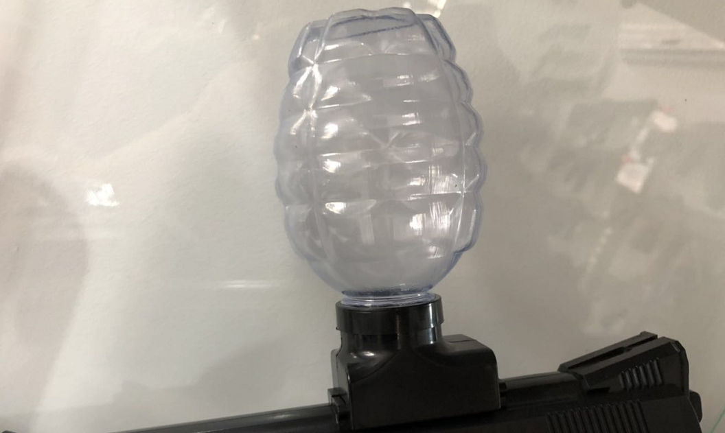 Grenade gel ball bottle with slide